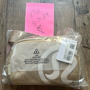 Limited edition lululemon logo everywhere belt bag trench/ white opal. NWT!!